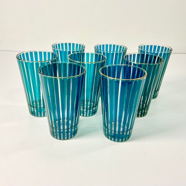 This set of 8 Mid-Century carnival tent stripe tumblers from the 1950s are just begging to be the star of a party. They...