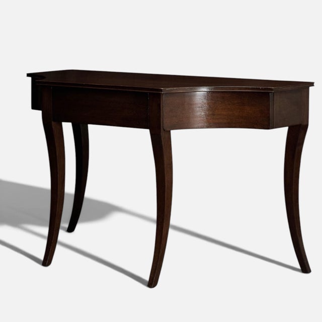 A lovely table from design guru Rose Tarlow. The Keats console is handmade of mahogany with a dark brown finish. Sculpted...