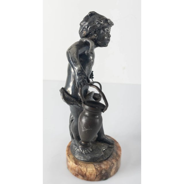 Figurative Silvered Metal Figure of a Boy Carrying Water For Sale - Image 3 of 11