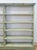 This charming handmade seafoam coastal wood shelf is a beautifully weathered and characterful display piece. The soft...