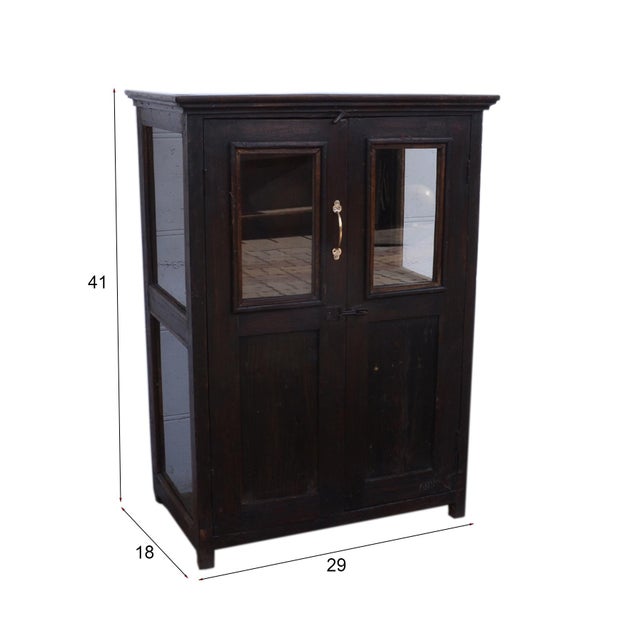 This reclaimed teak wood glass fronted cabinet by Manzel Furniture features a solid pattern with an aged metal handle...