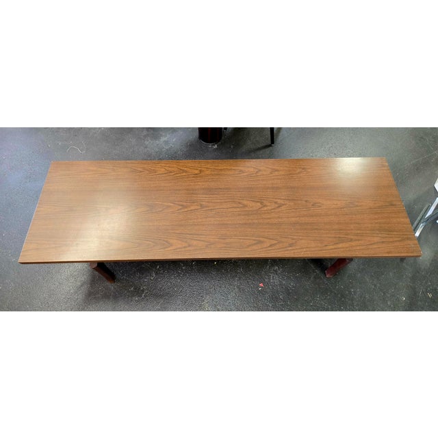 ​Bring timeless Danish-American modernism into your living space with this striking coffee table designed by the legendary...