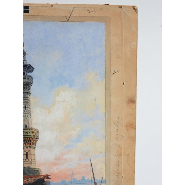 Early 20th century gouache on artist board painting of a harbor scene in the Middle East with ornate minaret, palm trees...