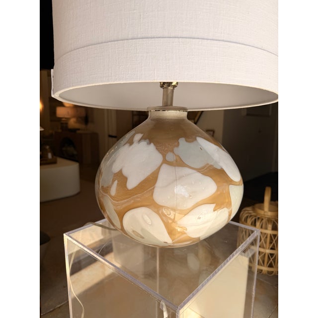 This bohemian table lamp brings an artistic, relaxed feel to any space. The rounded base features a beautiful blend of...