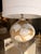This bohemian table lamp brings an artistic, relaxed feel to any space. The rounded base features a beautiful blend of...