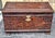 A Mid Century Middle Eastern intricately Carved Landscape Scenic Fruitwood Storage Chest. Carved on all sides including...