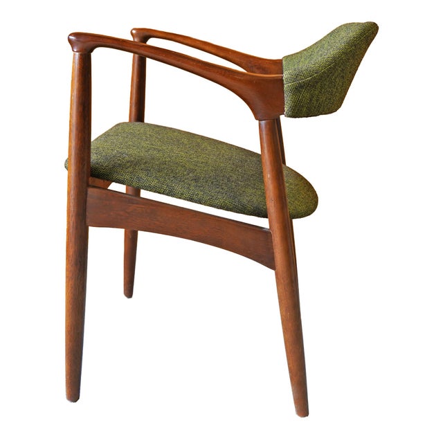 A beautifully sculpted mid-century modern armchair by Kosuga, Tokyo, Japan, dating to the 1960s–1970s. This piece reflects...