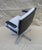 Office chair with upholstered seat and back in natural wool. Dark brown leather armrests and back of the chair. Five-star...