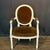 Exceptional pair of 19th century French Louis XVI fauteuil armchairs featuring beautifully executed, intricate carving...
