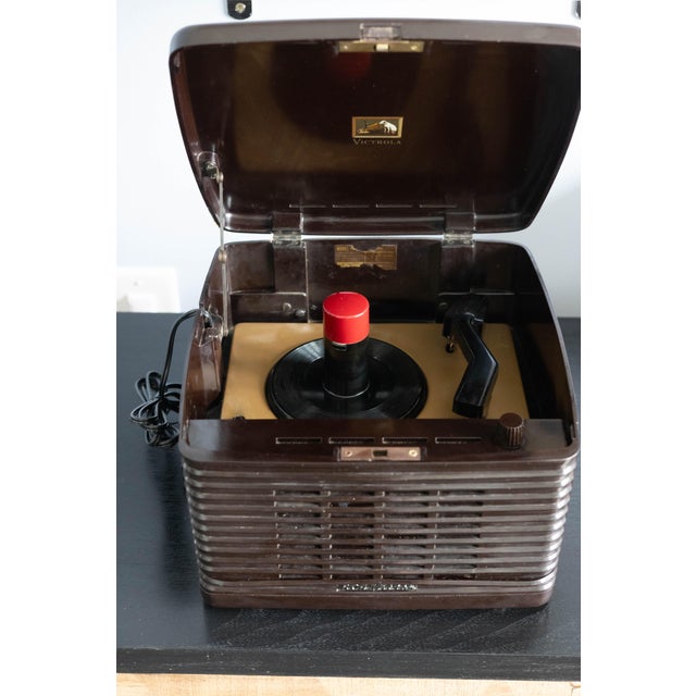 1950s RCA Victor 45EY3 45 Record Player Phonograph with Vintage Bakelite Case. This collectible item features the iconic...