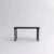 Small black wood and green marble "Sunday" dining table - Jean-Baptiste Souletie Dimensions: 150 W x 50 D x 74.5 H cm...