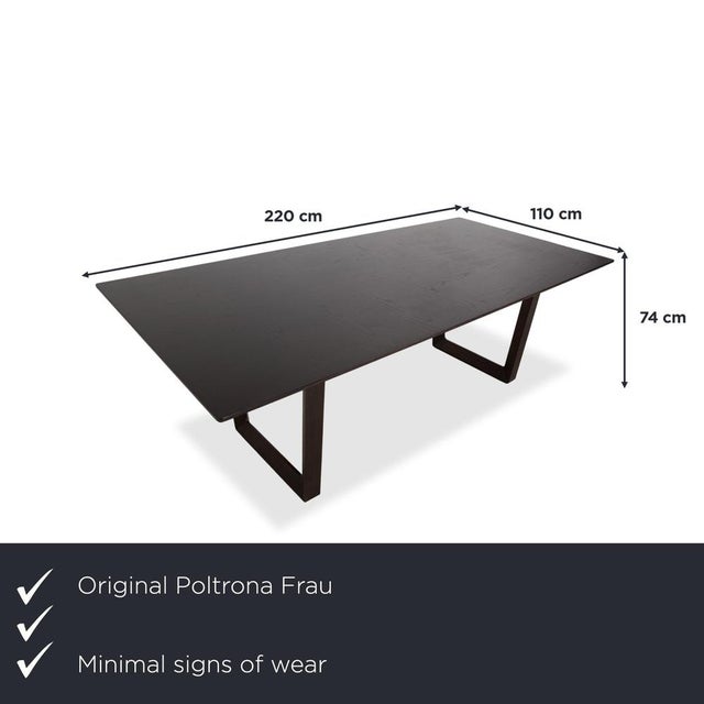 with this Poltrona Frau dining table, you bring Italian craftsmanship at its finest directly into your dining room. The...