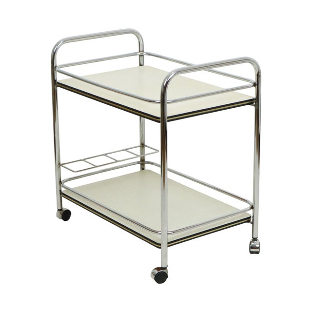Vintage metal trolley, serving cart, chrome design tubular frame and Formica top, 1960s Space Age style. High-quality...