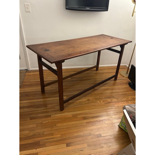 Beautiful antique solid hardwood table. Great as a console table and an altar table or many other uses. One inch taller...