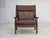 1970s, Danish design by H.J.Wegner. Highback armchair, model GE530. Brown furniture leather and dark oak wood. Original...