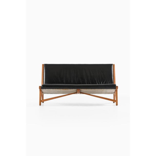 This rare sofa, model jh-555, was designed by hans wegner and produced by the cabinetmaker johannes hansen in denmark in...