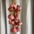 Decorative hanging ceramic garlic ristra. Southwest farmhouse kitchen decor hand-painted garlic bulbs in shades of mauve,...