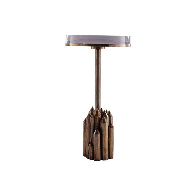 Artisinal Kryptonite points are hand-crafted and welded to create the bursting form of the creative and volcanic...