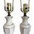 Absolutely stunning pair of Hollywood Regency elegant cream porcelain table lamps with gold brass base. In excellent...