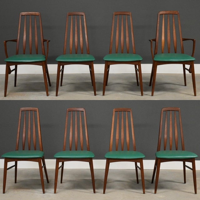 A set of eight green mid century modern teak high back Eva dining chairs with vertical slatted backs designed by Koefoeds...