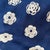 Chanel Navy Blue Monogram 100% Silk Scarf. Navy ground with cream camellias and interlocking CC logos, a cream border with...