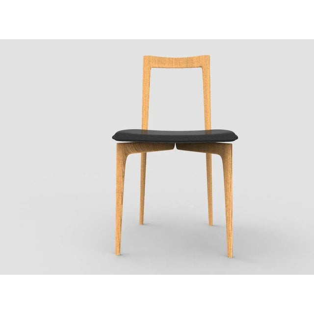 with a light solid wood structure, this chair is suitable for contemporary interiors, the chair’s proportions and...