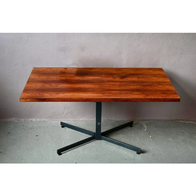 You'll never be caught off guard again! This 1960s rise & fall table by Ilse will allow you to go from appetizer to main...