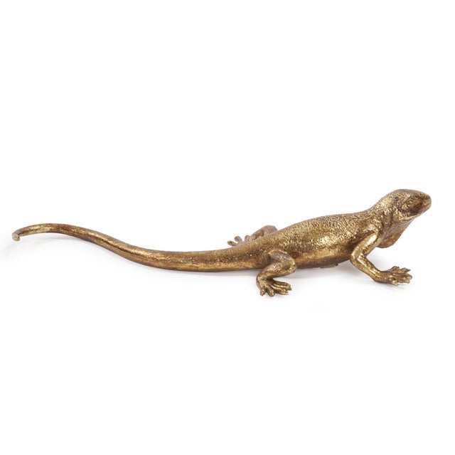 Capturing inspirations from the animal world is something that can enliven any decor. And our Golden Lizard Figure is no...