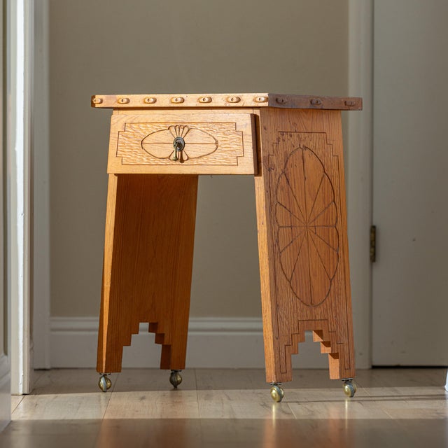 A distinctive handcrafted pine side table with documented New Mexico family provenance. According to the previous owner,...