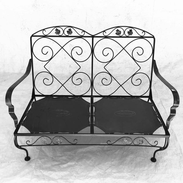 Vintage Wrought Iron Loveaseat with 4 floral cushions ,46"L X 33"H X 32"D X Seat Hight 19",Makers mark reads " Meadow...