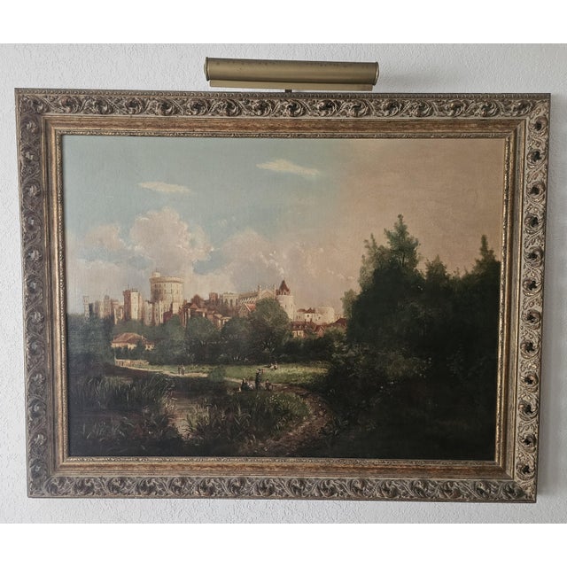 An impressive large-scale mid-century oil painting depicting Windsor Castle overlooking the River Thames, presented in an...