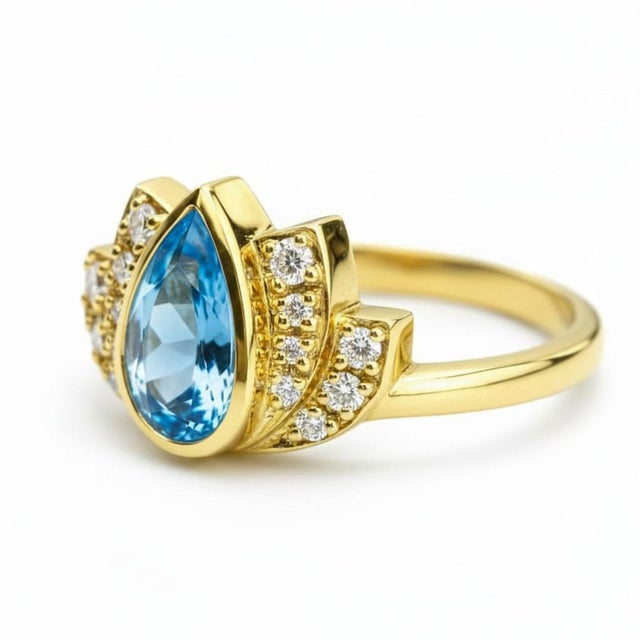 Lotus gold ring with topaz silver, gold. Lotus flower ring. Floral ring. Pear topaz ring. Weight: 3.5 g. depends from size...