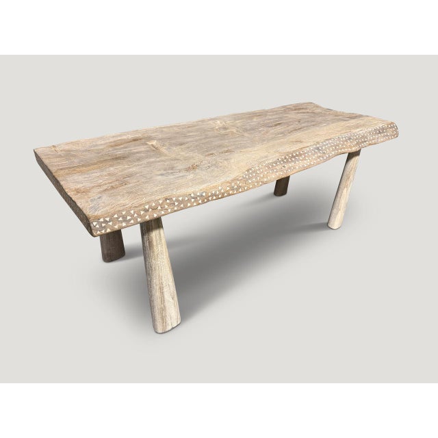 A beautiful century old thick teak slab with a slight live edge, has been hand crafted into a unique coffee table whilst...