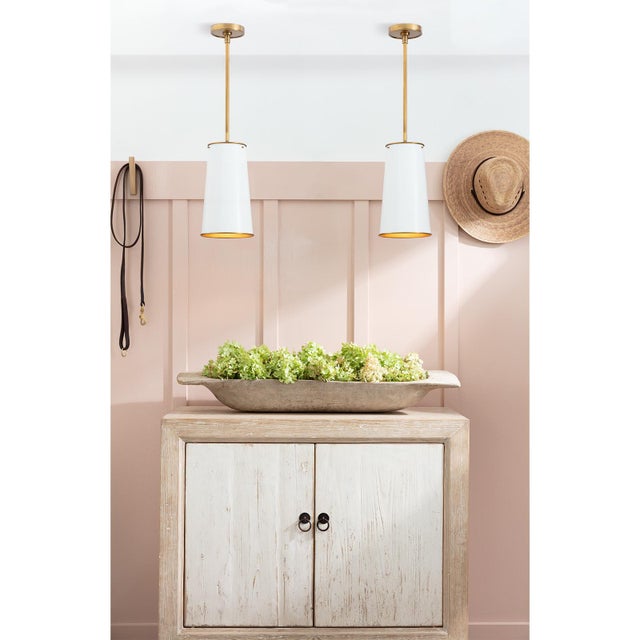 The sleek silhouette and vintage charm of the Hattie Pendant is a perfect addition to any modern traditional home. The...