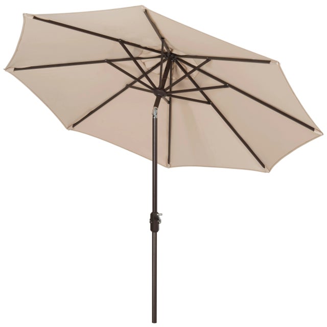 Conjure images of the Riviera with a classic beige market umbrella for dining al fresco at a romantic café. Keep cool on...