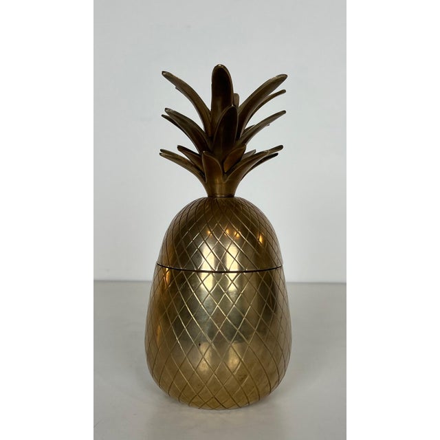 This lovely pineapple-shaped ice bucket is made of brass and steel. It is a French piece. Circa 1970