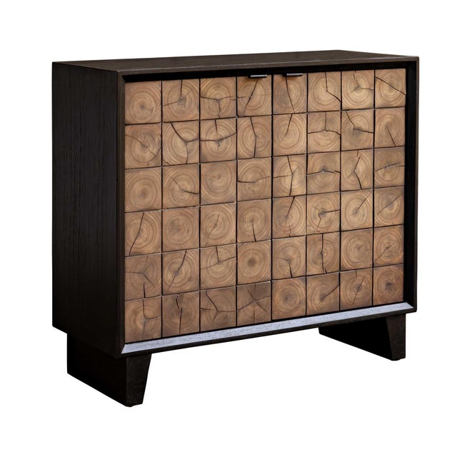 This Two Door Cabinet Is Crafted From Mindi Wood With A Sleek Black Finish. The Cabinet Fronts Feature A Grid Pattern,...