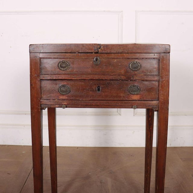 Early 19th C English pine lamp table with 1 drawer and brushing side. 1820 This piece is designed in the style of the...