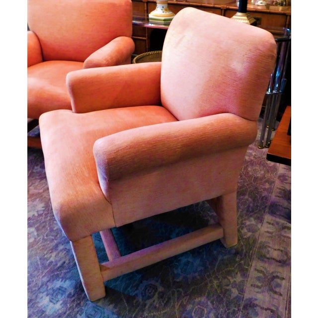These vintage coral colored chairs are a rare embodiment of the spirit of two premier powerhouses. For four generations,...