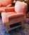 These vintage coral colored chairs are a rare embodiment of the spirit of two premier powerhouses. For four generations,...