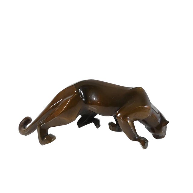 Rare bronze sculpture of a puma. Elaborately crafted in the Art Deco style. Designed by the internationally renowned...