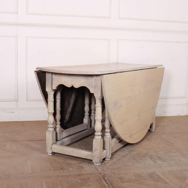 19th C copy of 18th C double gate leg bleached oak dining. 1890 Leaf tops up 196cm long x 168cm W This piece is designed...