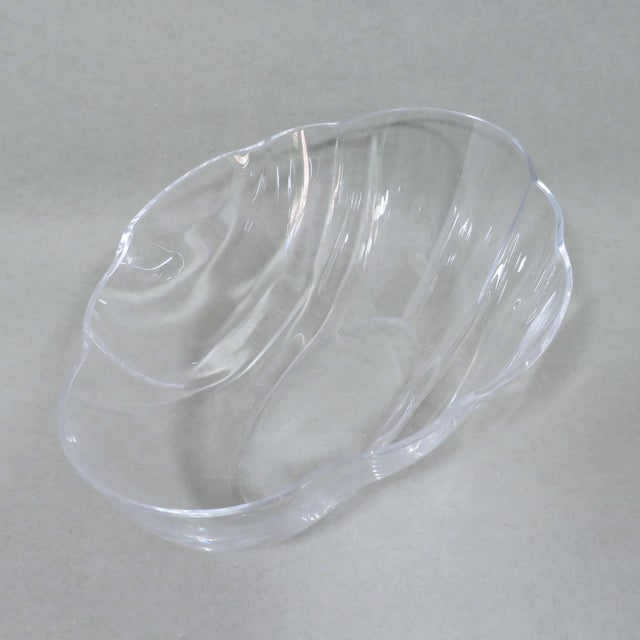 Signed Carlo Moretti (1934-2008) transparent blown glass console bowl, formed in an oval, undulating shape, and a flat...