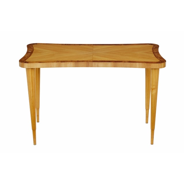 Mid 20th century Scandinavian birch shaped coffee table circa 1950. Unusual concave shaped sides. Quarter veneer birch top...