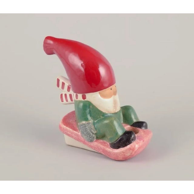 Lisa Larson for Gustavsberg. Ceramic candlestick. Elf on the sledge. Late 20th century. In perfect condition. Signed....