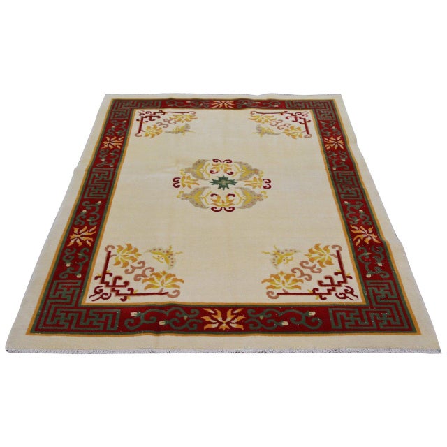 Hand-knotted with care using traditional rug-making techniques, this wool rug blends timeless craftsmanship with a modern...