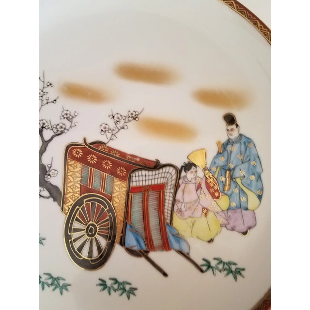 Vintage Japanese Porcelain Decorative Plate. This is a stunning hand painted plate depicting a Emperor and his wife beside...