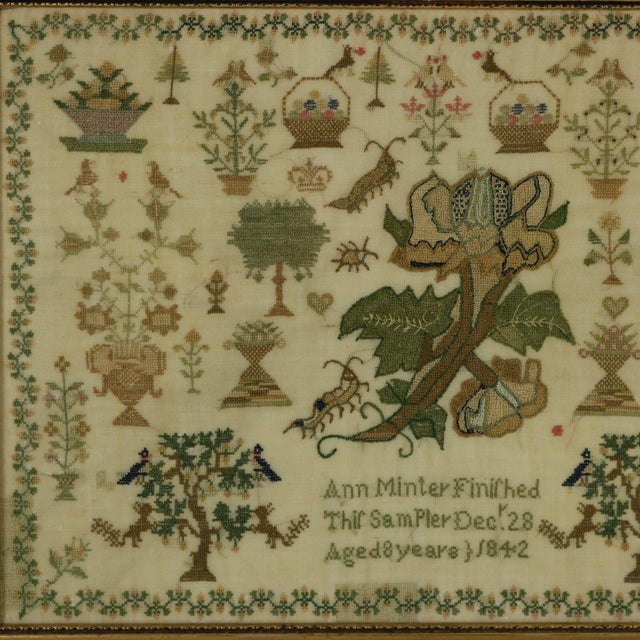 Victorian Sampler, 1842, by Ann Minter Aged 8 Years. The sampler is worked in silk on linen ground, mainly in cross...