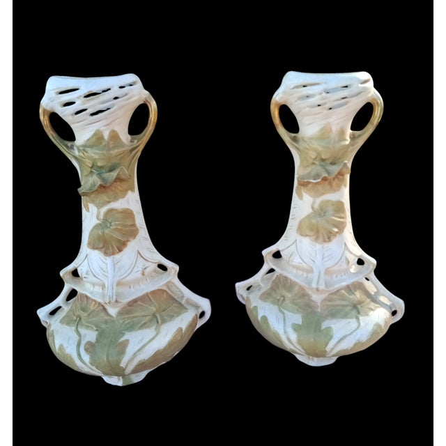 Pair of late 19th century vases from the Royal Dux Bohemia factory with a splendid floral decoration (water lilies and...