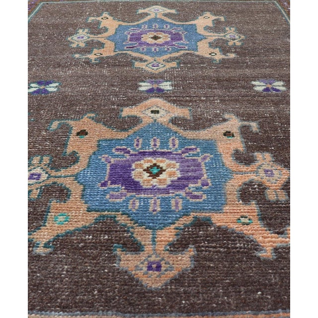 Tribal Turkish Oushak Rug With Bold Brown and Vibrant Blue Floral Medallions 2'7"x3'7" For Sale - Image 3 of 10